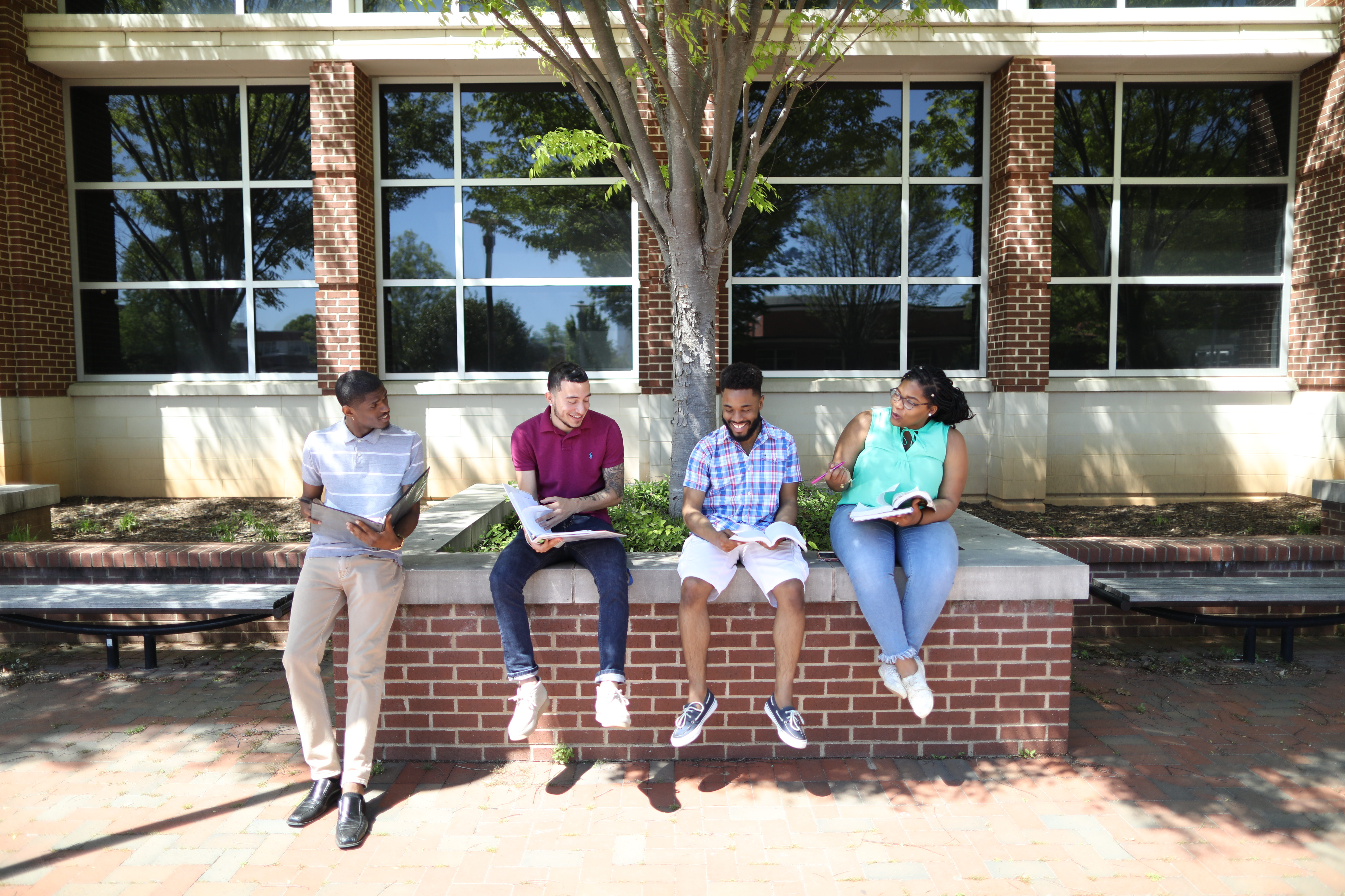 a and t students enjoy a break between classes