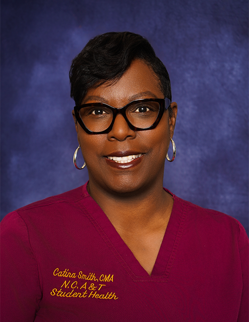 CMA Catina in a professional photo in scrubs