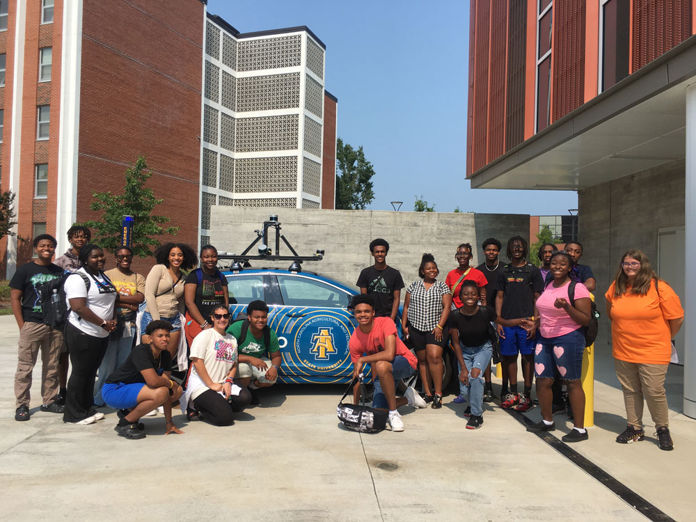 The 2023 STI cohort visiting the Martin Engineering Building.