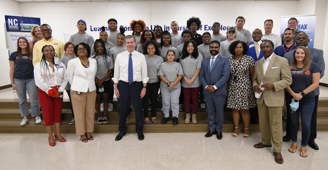 This is a group photo of the partners and students of the Clean Energy Apprenticeship Program